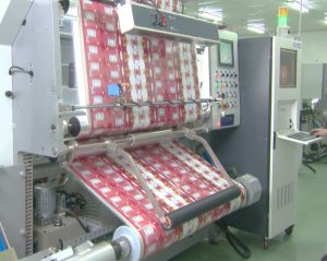 布の処理をしている機械の写真